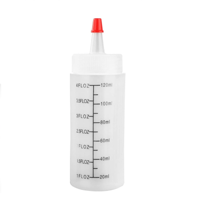 A white plastic bottle with a red lid.